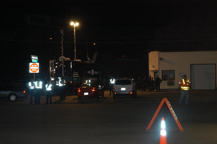 Police officers conducting a traffic stop.