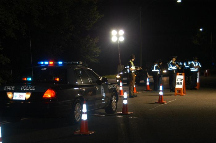 Police officers conducting a traffic stop.