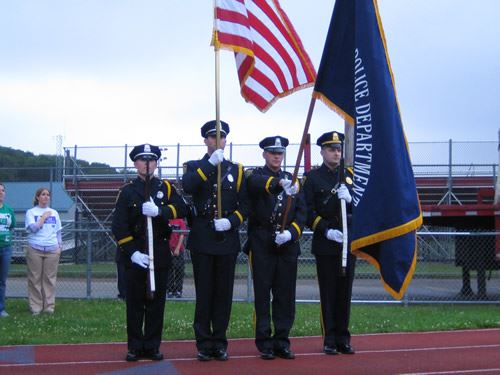 Police Honor Guard Standing on a Track